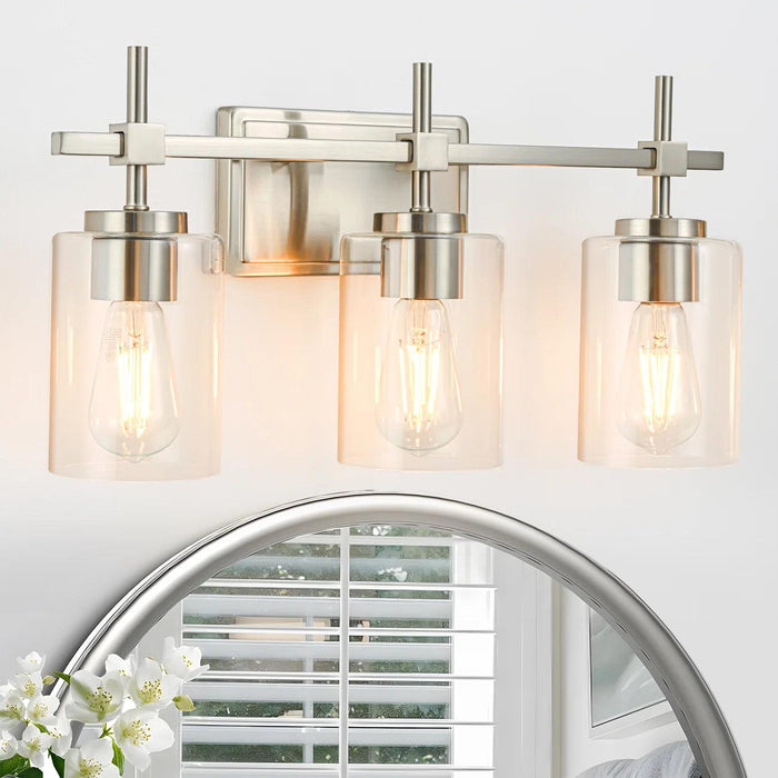 Lámpara de tocador de baño moderna Jasper de 3 luces de vidrio transparente, negra y níquel