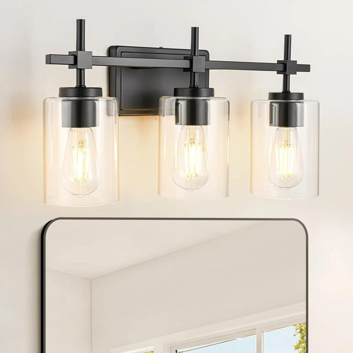Lámpara de tocador de baño moderna Jasper de 3 luces de vidrio transparente, negra y níquel