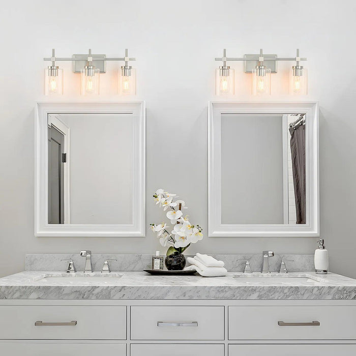 Lámpara de tocador de baño moderna Jasper de 3 luces de vidrio transparente, negra y níquel