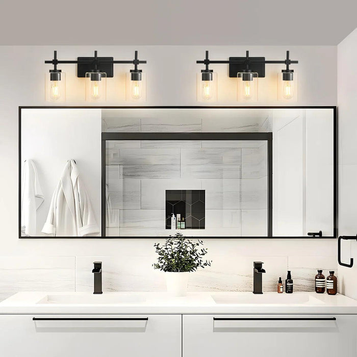 Lámpara de tocador de baño moderna Jasper de 3 luces de vidrio transparente, negra y níquel