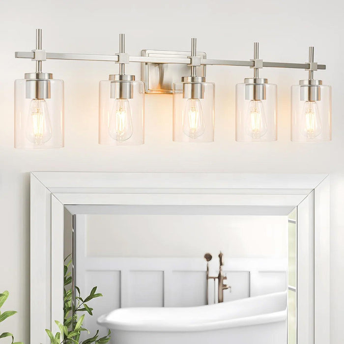 Lámpara de tocador lineal para baño Jasper Modern de 5 luces en níquel cepillado y vidrio transparente negro